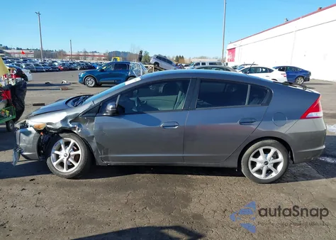 2010 Honda Insight Lx z USA, uszkodzony, nr VIN JHMZE2H50AS014506